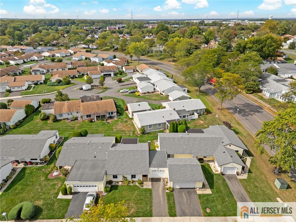 25C Pitman Road, Unit B Monroe Township, NJ 08831 - Photo 29 of 29 an aerial view of residential houses with outdoor space