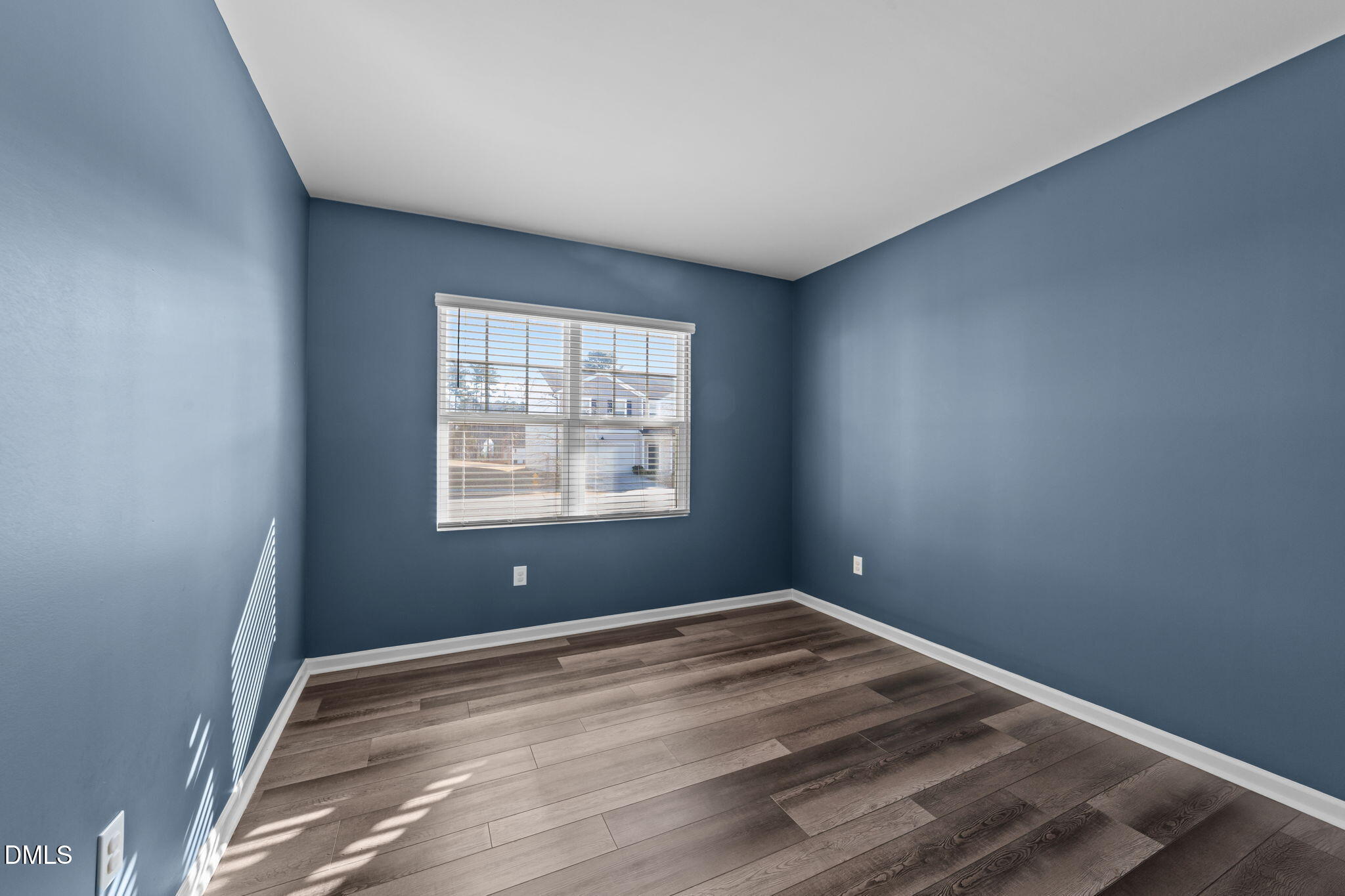 1421 Justice Union Court Raleigh, NC 27604 - Photo 9 of 21 a view of an empty room with a window