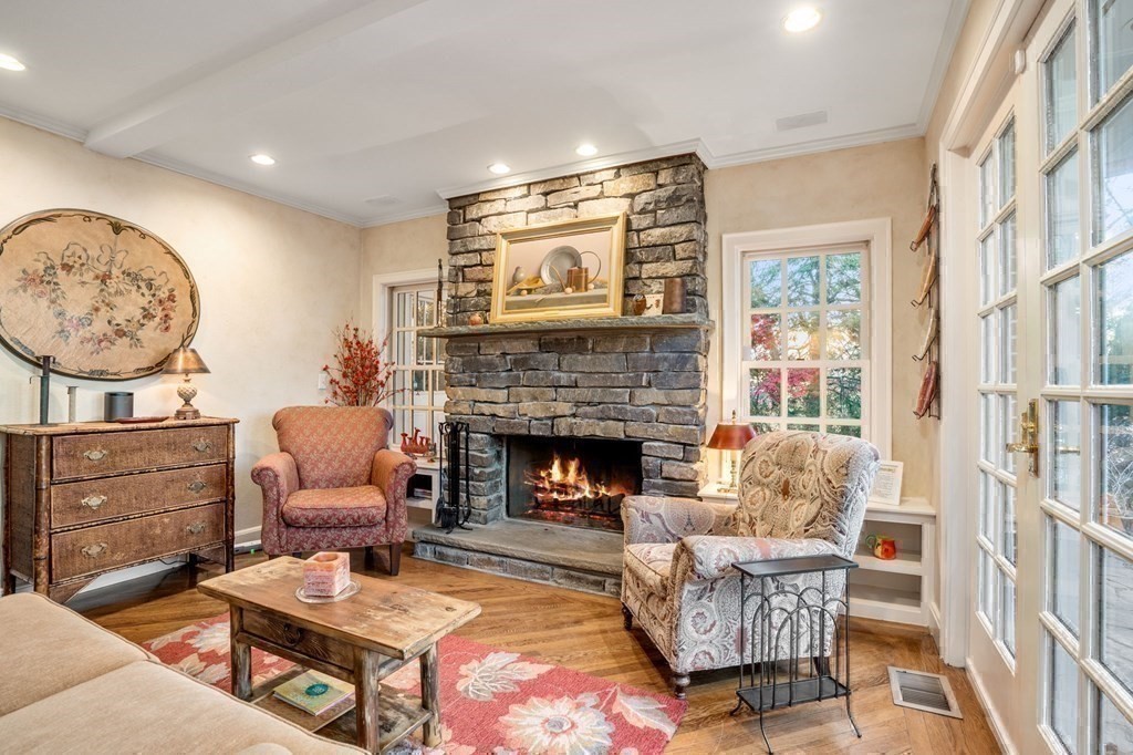 37 Boulder Road Wellesley, MA 02481 - Photo 20 of 42 a living room with furniture a fireplace and a large window