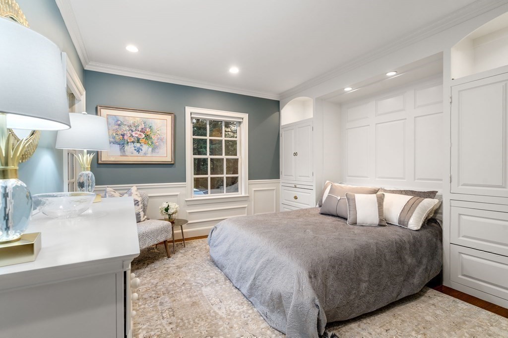 37 Boulder Road Wellesley, MA 02481 - Photo 21 of 42 a spacious bedroom with a large bed and a couch