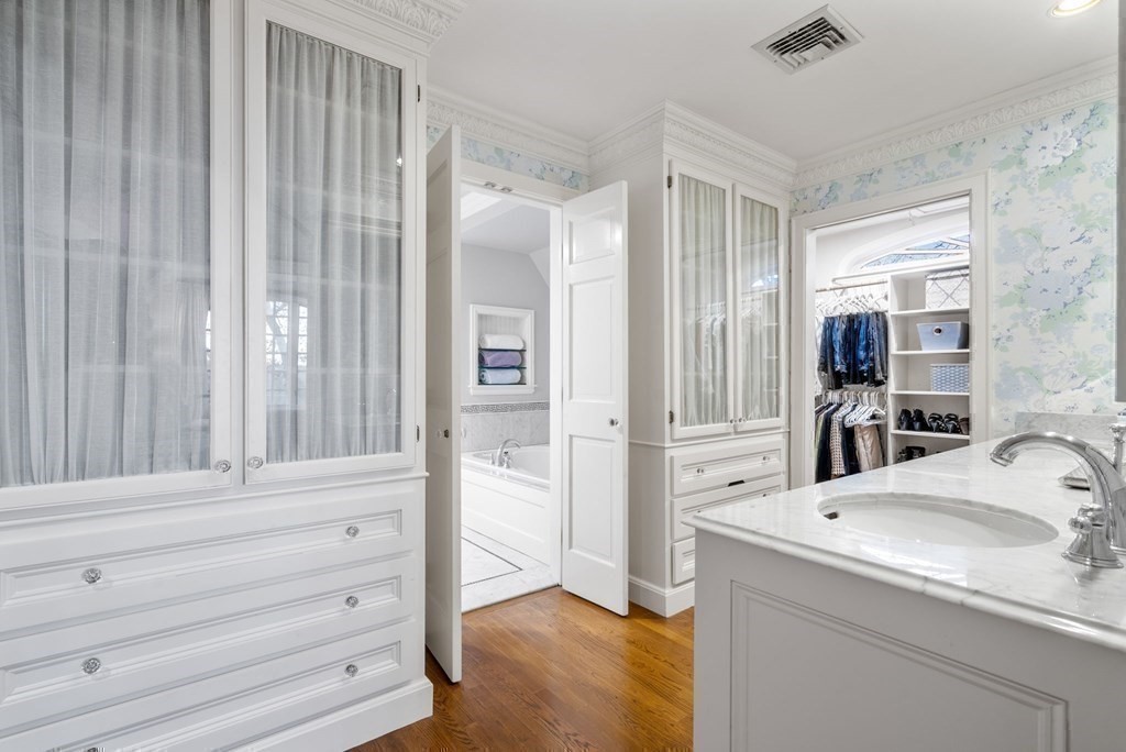 37 Boulder Road Wellesley, MA 02481 - Photo 28 of 42 a bathroom with a sink and a mirror