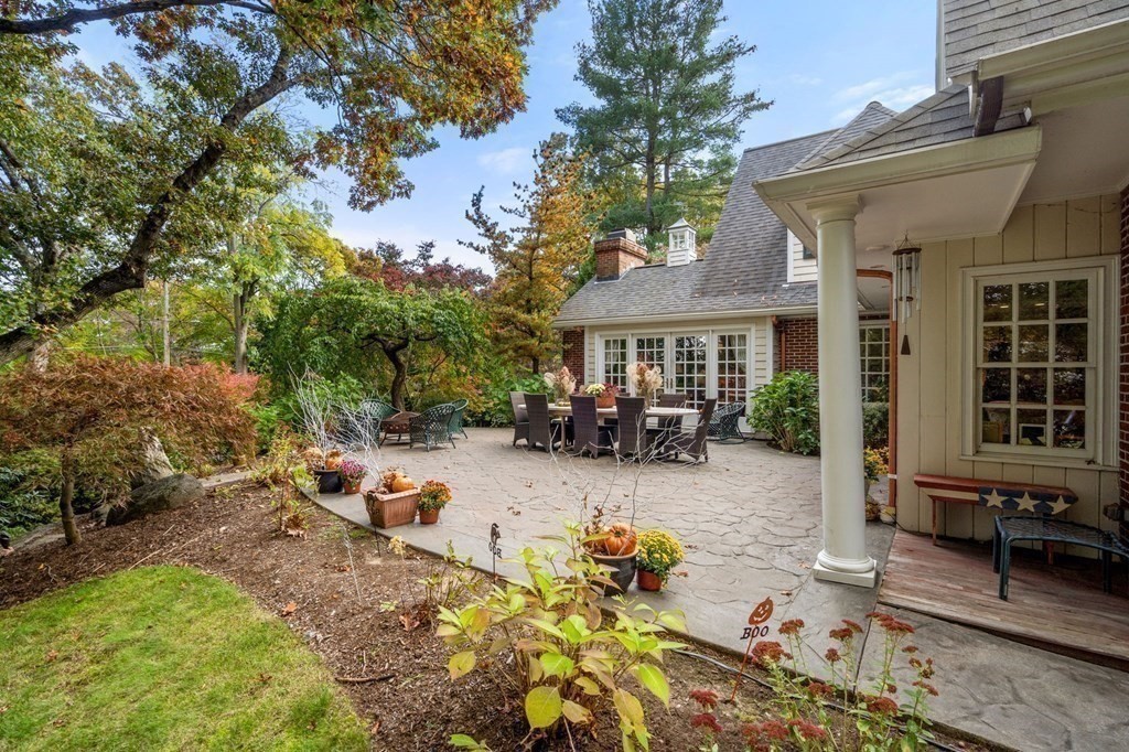 37 Boulder Road Wellesley, MA 02481 - Photo 37 of 42 a view of a house with backyard couches and a fire pit