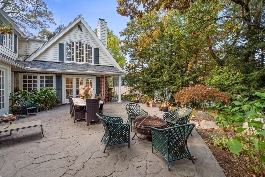 37 Boulder Road Wellesley, MA 02481 - Photo 38 of 42 a view of a house with backyard sitting area and garden