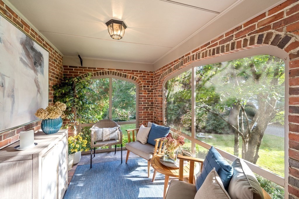 37 Boulder Road Wellesley, MA 02481 - Photo 8 of 42 a view of a chairs and table in a patio