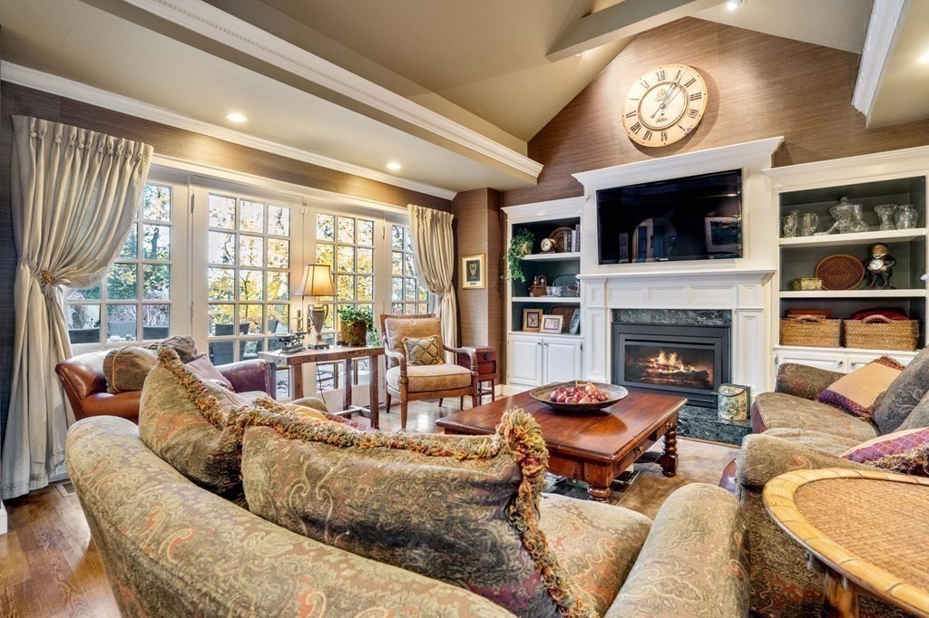 37 Boulder Road Wellesley, MA 02481 - Photo 9 of 42 a living room with furniture fireplace and a large window