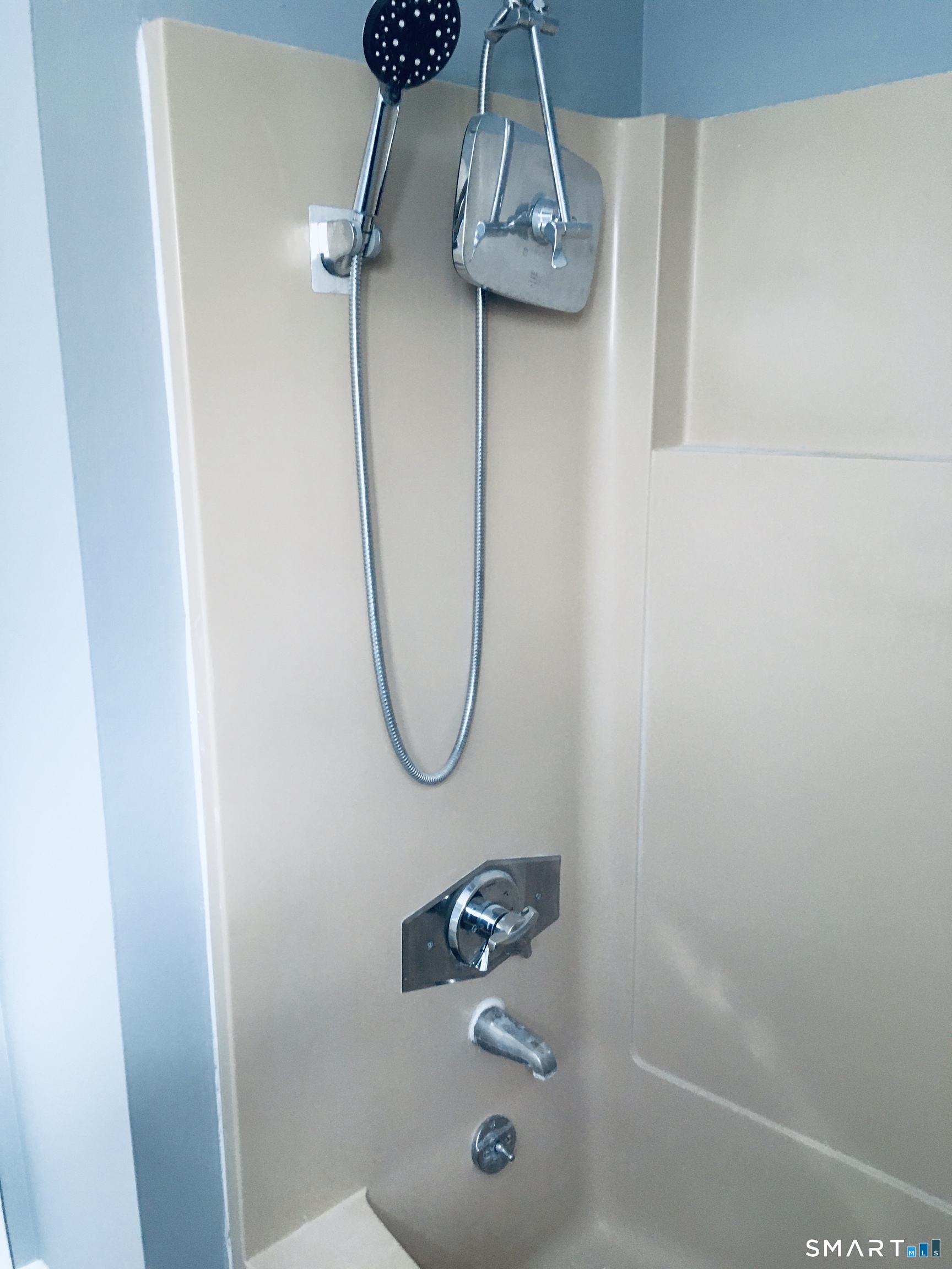 285 Queen Street, Unit 4F Southington, CT 06489 - Photo 20 of 22 a bathroom with a shower and mirror