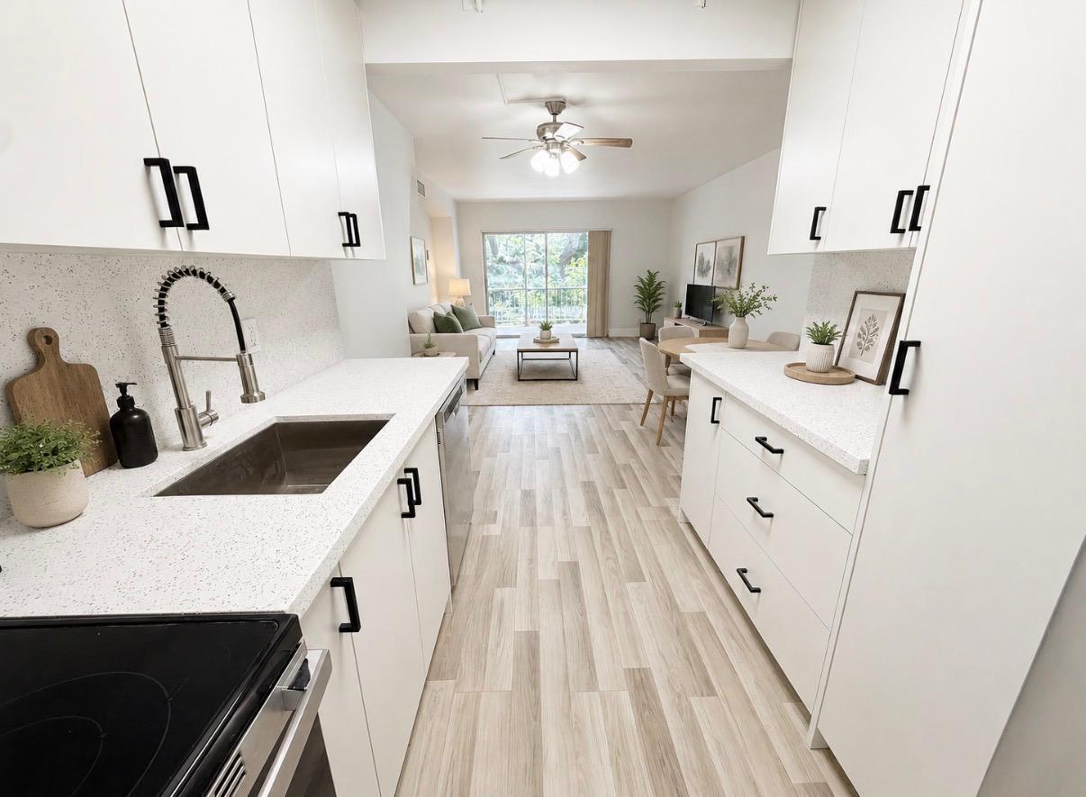 610 Northwest 13th Street, Unit 210 Boca Raton, FL 33486 - Photo 2 of 15 KITCHEN AND LIVING ROOM