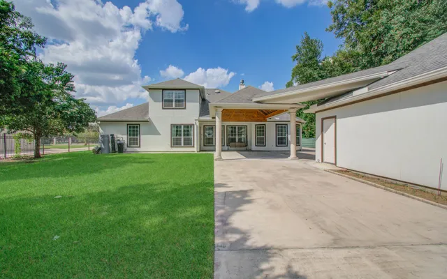 a view of gallery with wooden floor