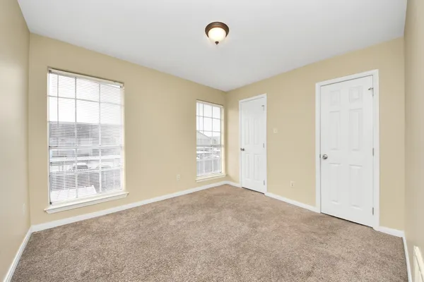 a bathroom with a bathtub sink vanity and a mirror