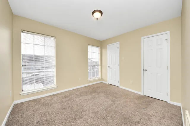 a bathroom with a bathtub sink vanity and a mirror