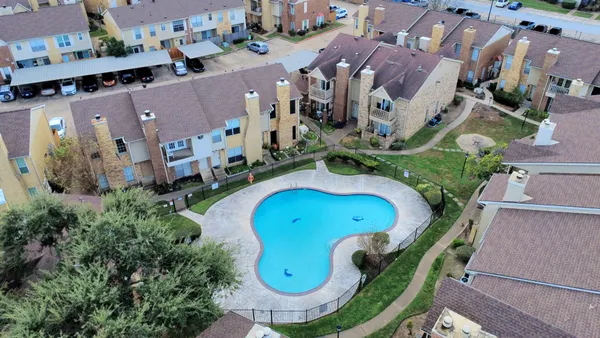 an aerial view of a swimming pool