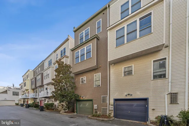 a view of a building with a street