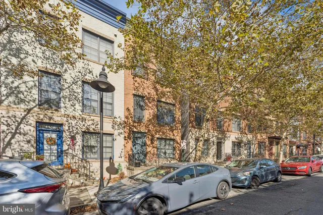 a car parked in front of a building
