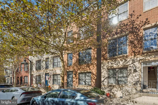 a city street lined with tall buildings