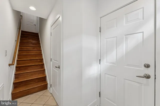 a view of a hallway with stairs
