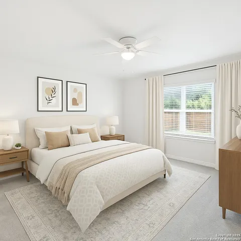 a bedroom with a large bed and a window