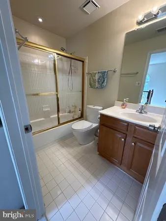 a bed room with a bed and a table