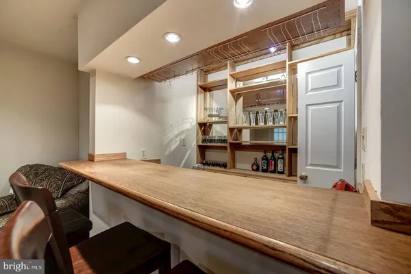 a bathroom with a toilet a sink and shower