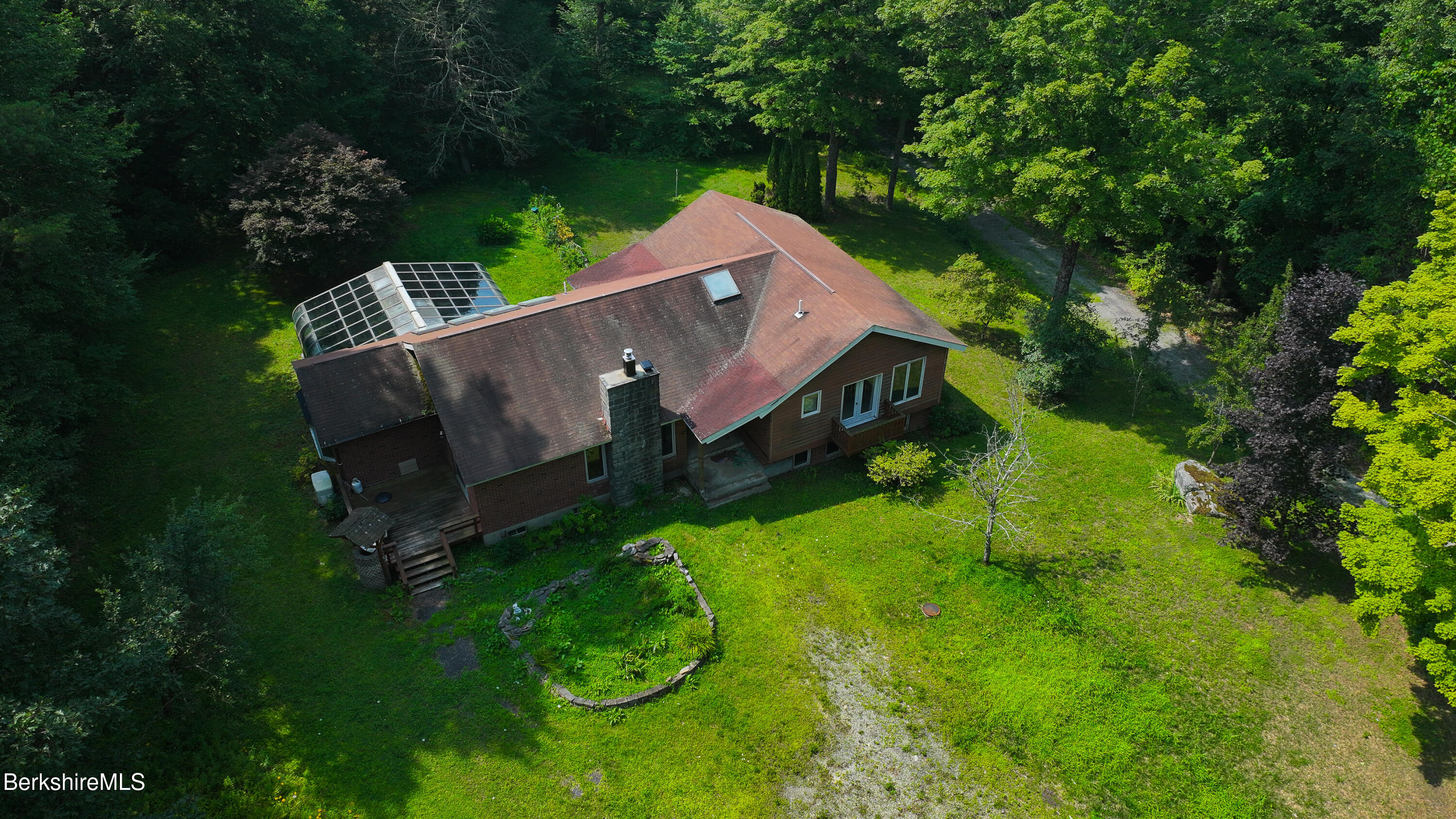 132 North Road Tolland, MA 01034 - Photo 3 of 8 an aerial view of a house