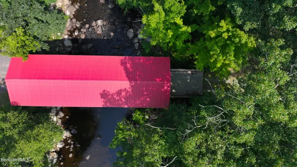 a view of a sign in front of a house