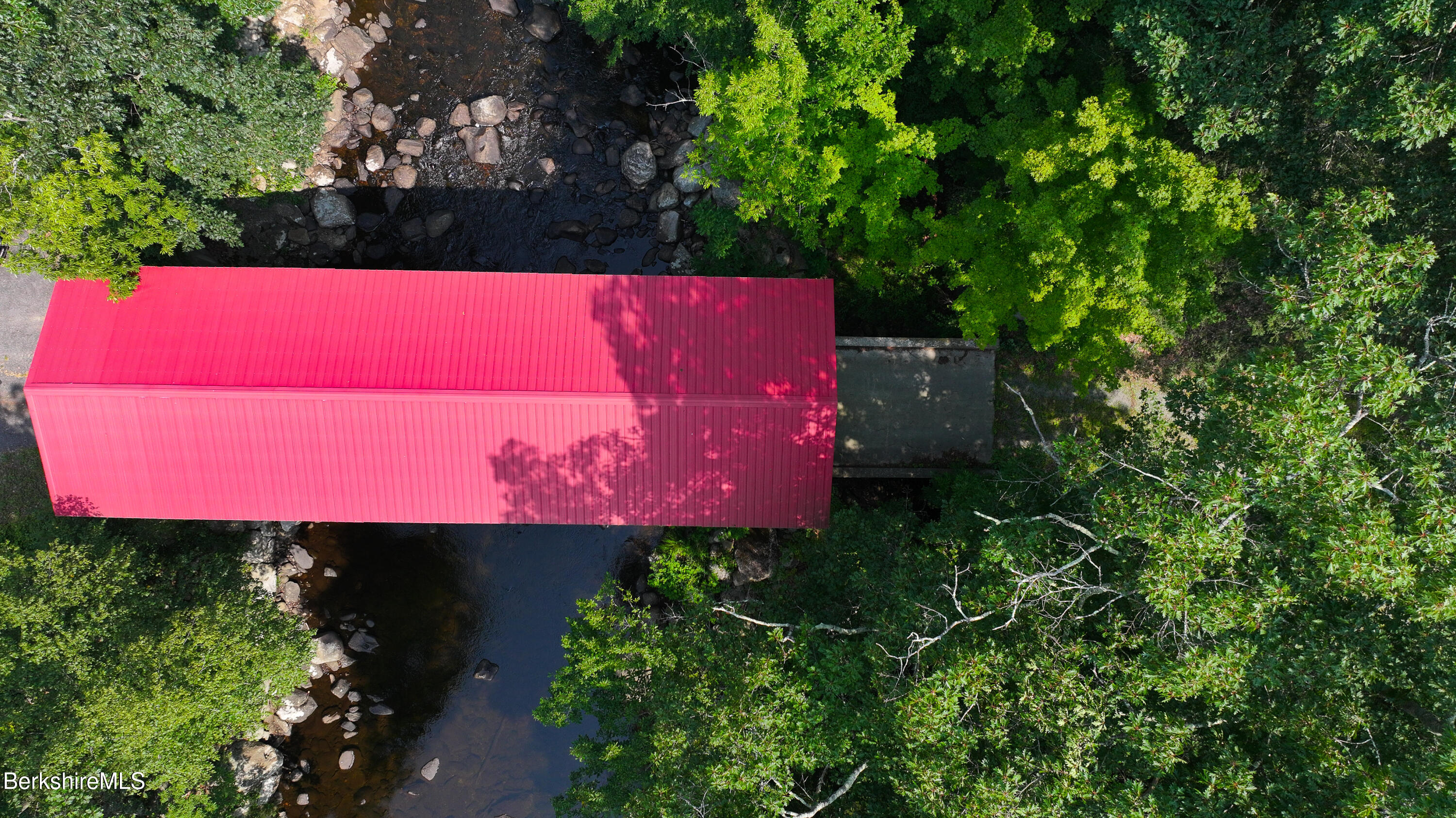 132 North Road Tolland, MA 01034 - Photo 6 of 8 a view of a sign in front of a house