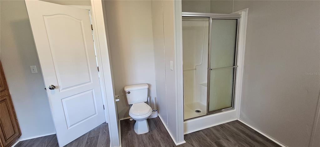 960 Still Road, Unit 1 Pierson, FL 32180 - Photo 25 of 67 a bathroom with a toilet and a shower