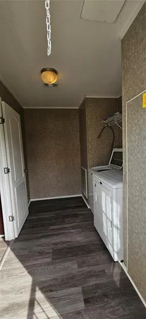 a living room filled with furniture and a table