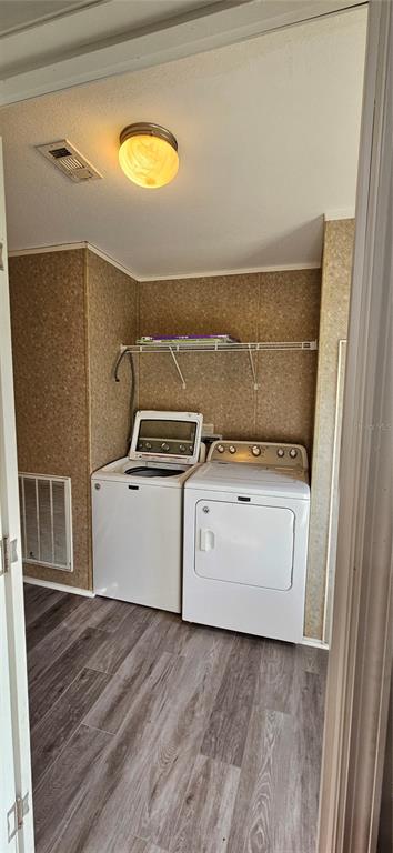 960 Still Road, Unit 1 Pierson, FL 32180 - Photo 42 of 67 a utility room with dryer and washer
