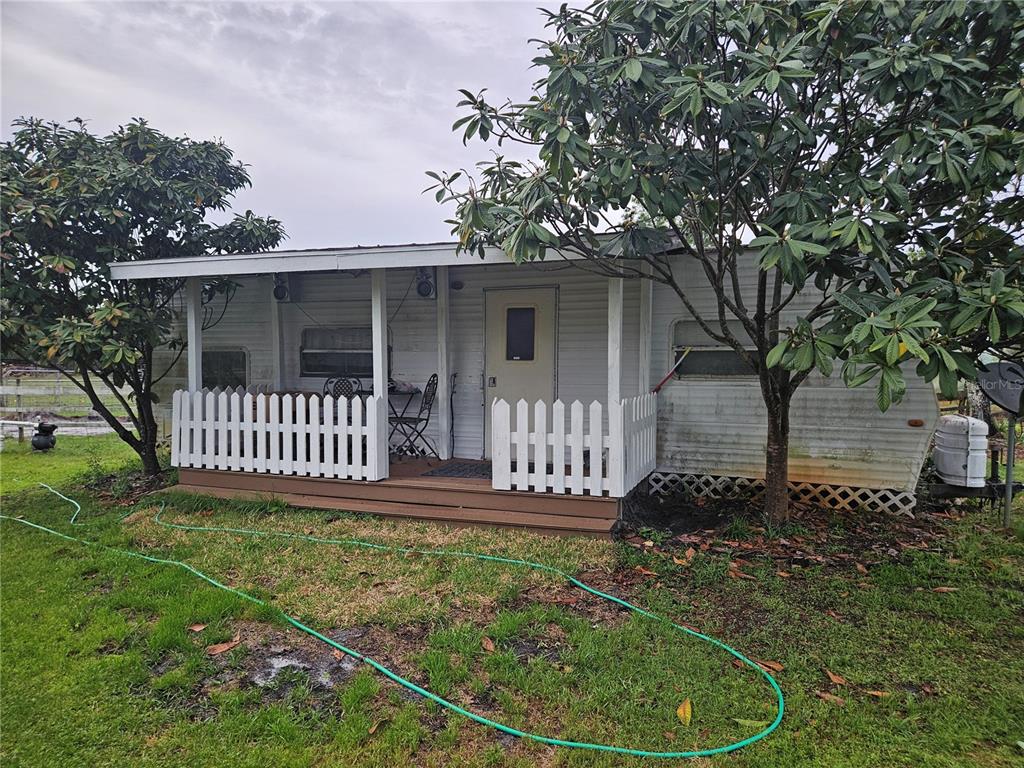 960 Still Road, Unit 1 Pierson, FL 32180 - Photo 56 of 67 a front view of a house with garden