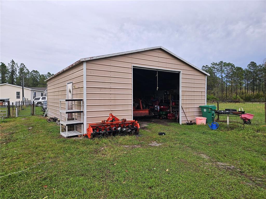 960 Still Road, Unit 1 Pierson, FL 32180 - Photo 58 of 67 a view of a house with a backyard