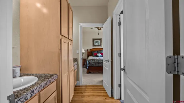 a en suite bathroom with a sink and a shower