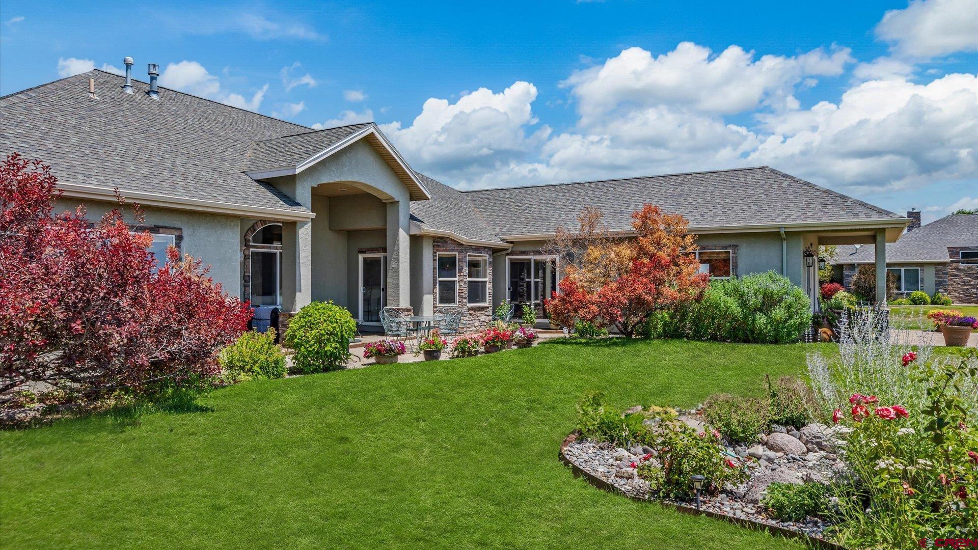 18222 6300th Road Montrose, CO 81403 - Photo 25 of 45 a front view of house with a garden