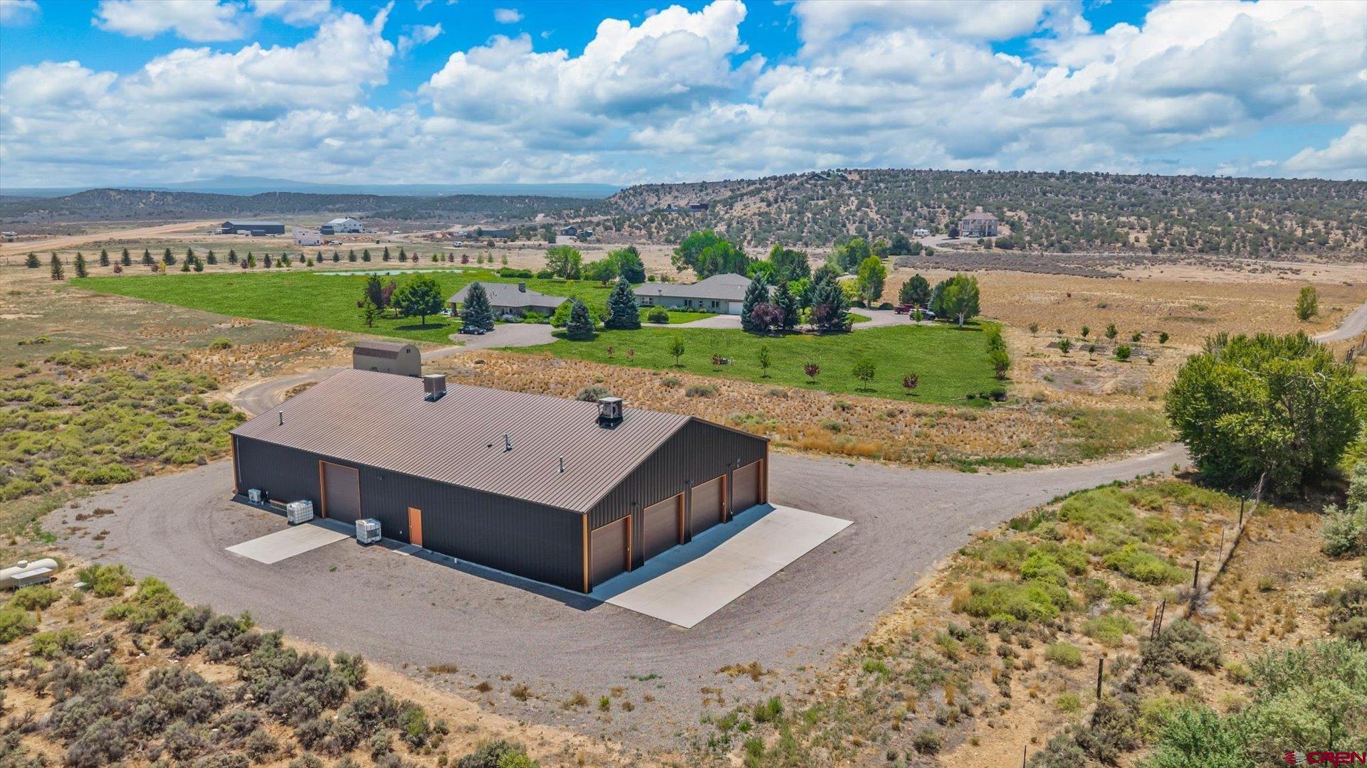 18222 6300th Road Montrose, CO 81403 - Photo 40 of 45 a view of a terrace with a garden