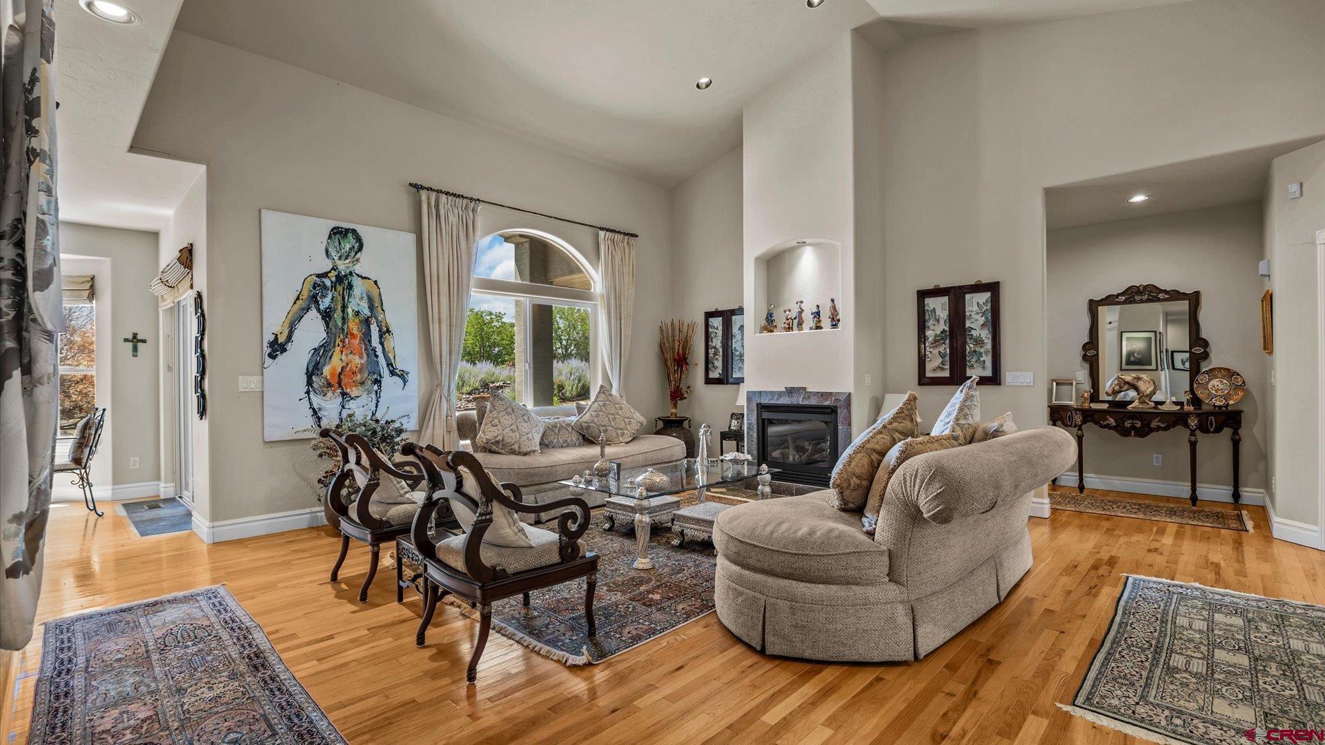 18222 6300th Road Montrose, CO 81403 - Photo 8 of 45 a living room with furniture and wooden floor