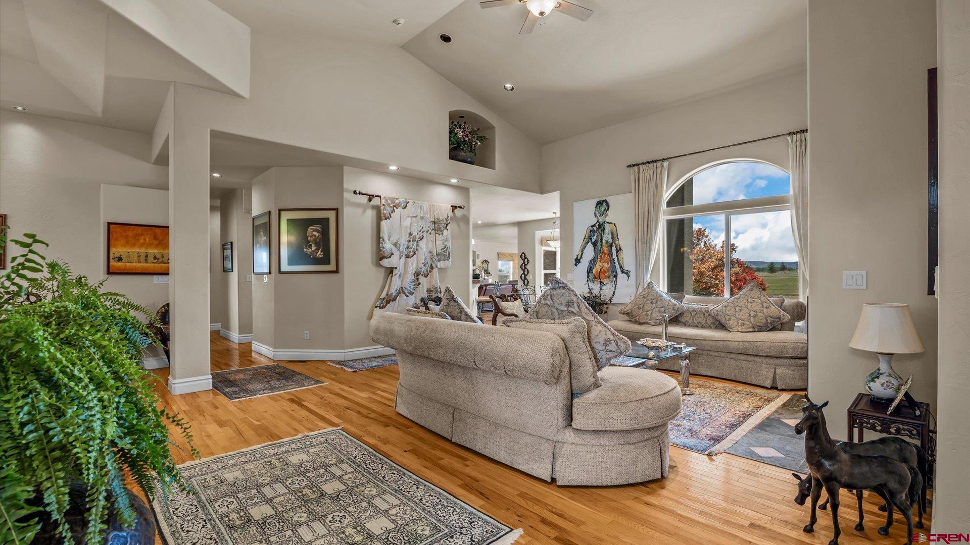 18222 6300th Road Montrose, CO 81403 - Photo 9 of 45 a living room with furniture and wooden floor