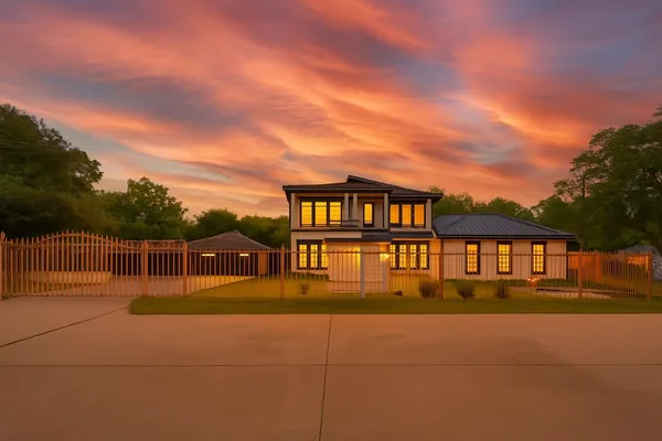front view of a house with a street