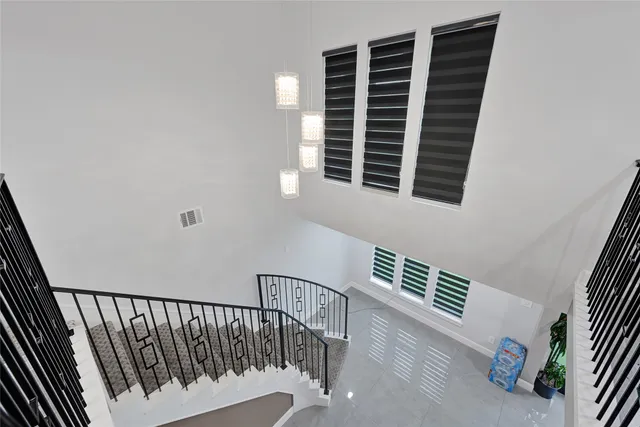 a kitchen with a sink cabinets and stainless steel appliances