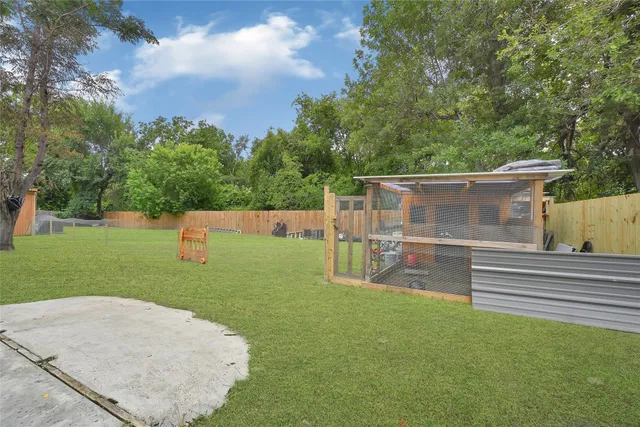 a house view with a garden space