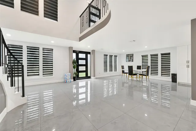 a view of livingroom with furniture and windows