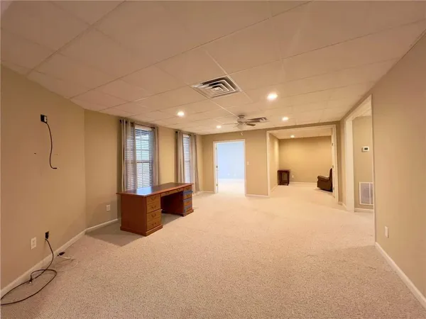 an empty room with windows