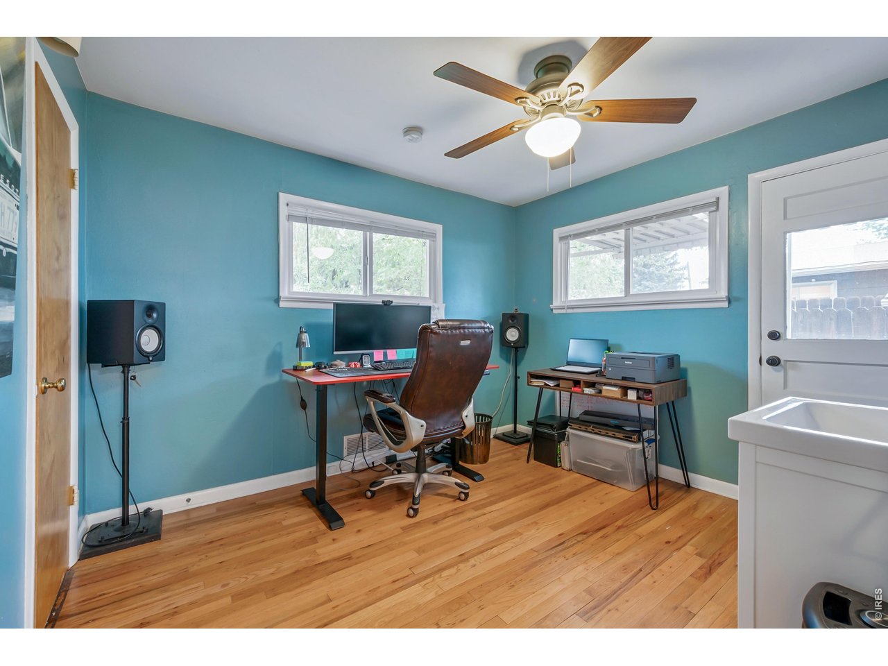1709 Dale Court Fort Collins, CO 80521 - Photo 20 of 26 a workspace with wooden floor