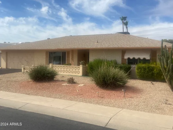 a view of a house with a patio