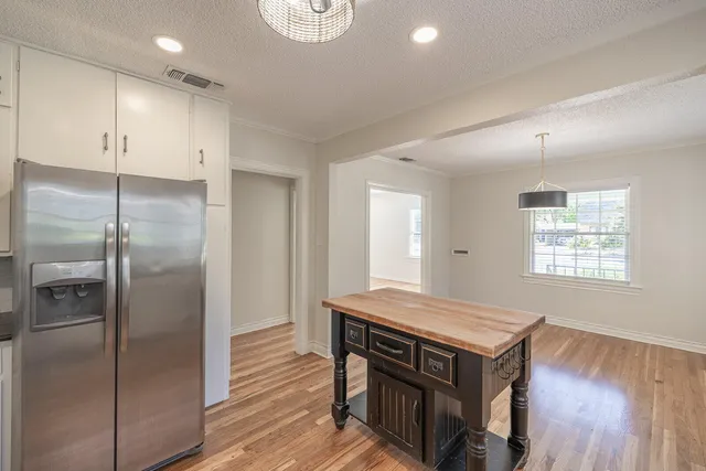 a bathroom with 2 sink and a mirror