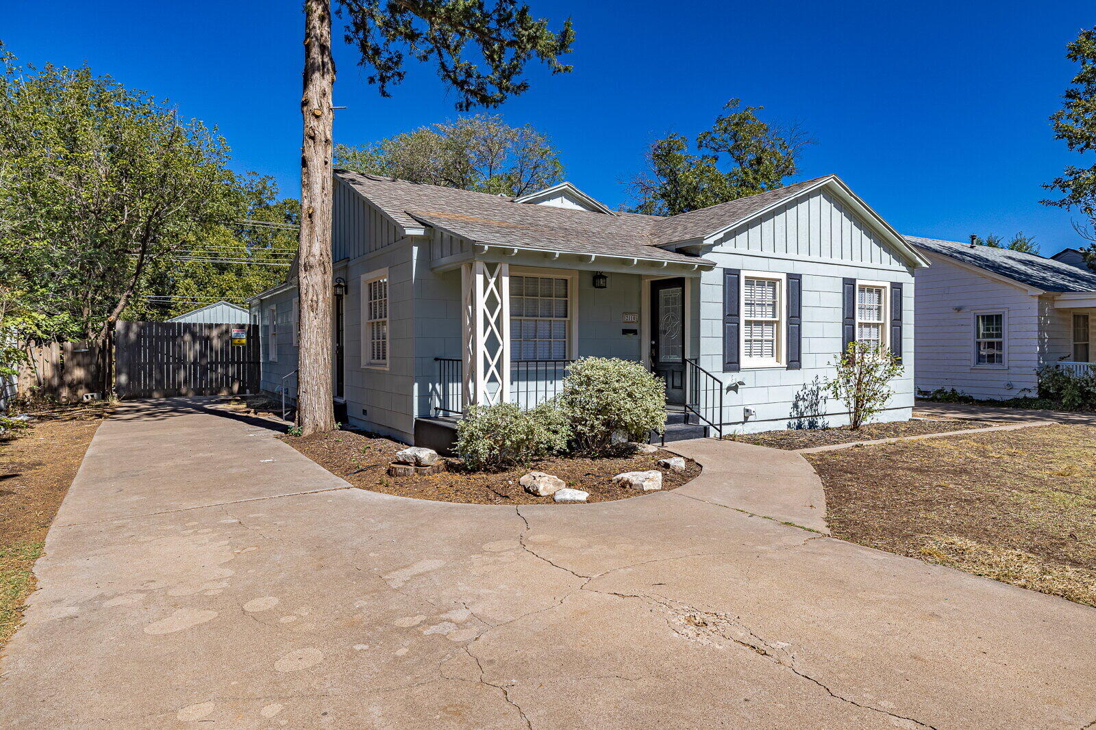 2810 24th Street Lubbock, TX 79410 - Photo 2 of 47 a view of a house with a yard and potted plants