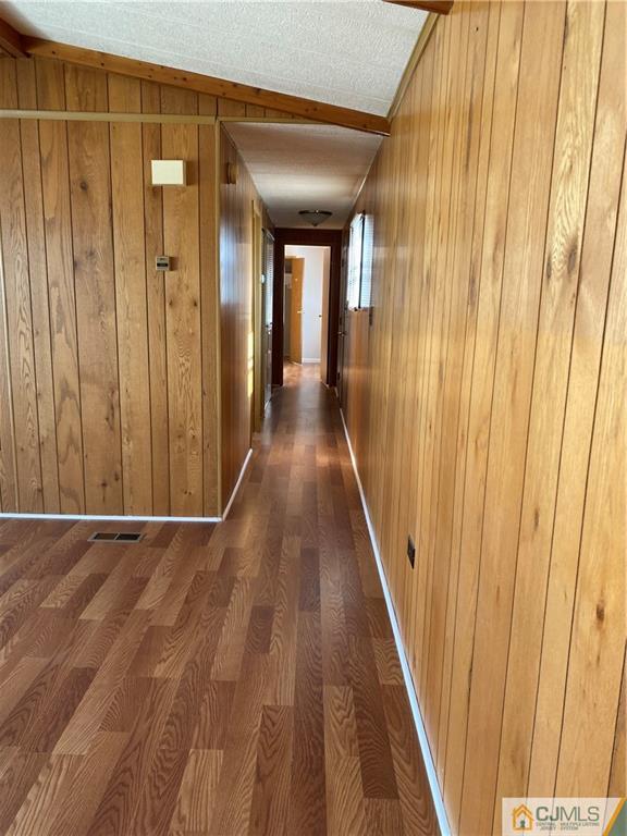 7 Poe Road North Brunswick, NJ 08902 - Photo 12 of 19 a view of a hallway with wooden floor