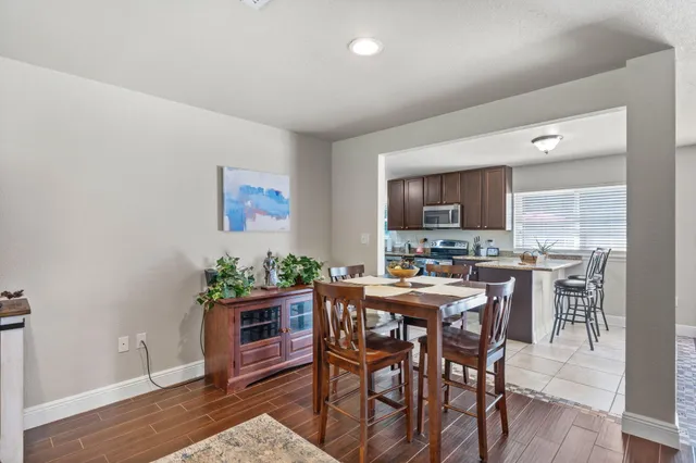 a view of a lake with houses in the background
