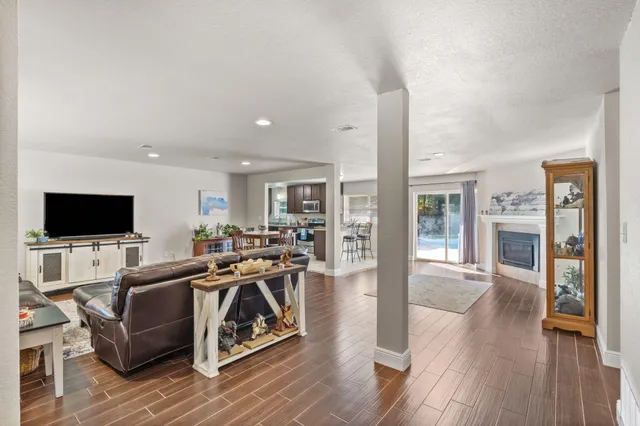 a bathroom with a shower and a glass door