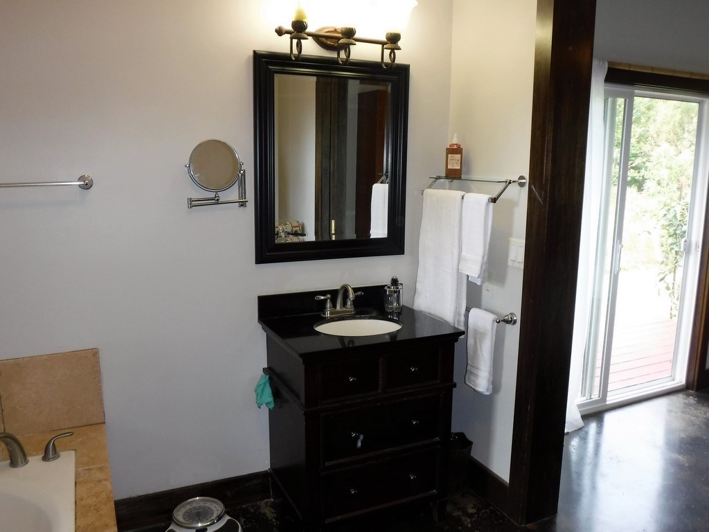 1209 West Kuiaha Road, Unit 2 Haiku, HI 96708 - Photo 17 of 30 a bathroom with a sink and a mirror