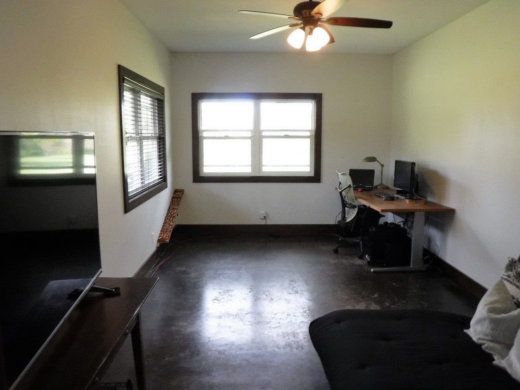 1209 West Kuiaha Road, Unit 2 Haiku, HI 96708 - Photo 25 of 30 a room with furniture and a window