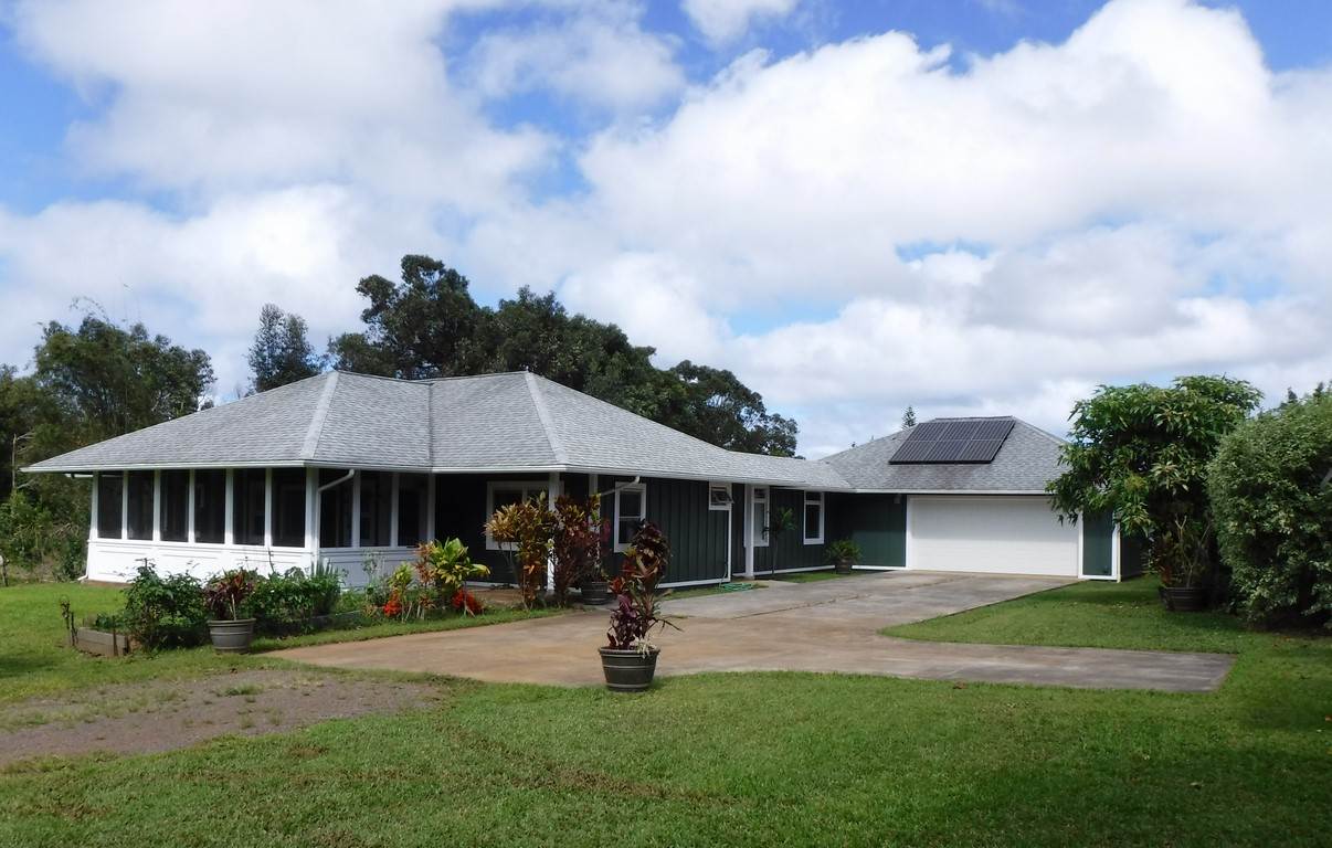 1209 West Kuiaha Road, Unit 2 Haiku, HI 96708 - Photo 28 of 30 a view of a house with backyard and garden